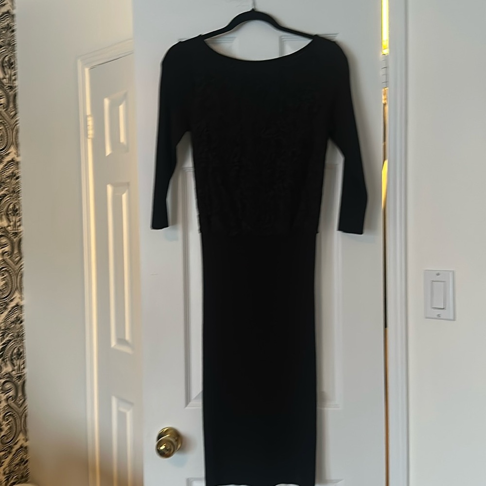 Zara knit black three-quarter sleeve dress.